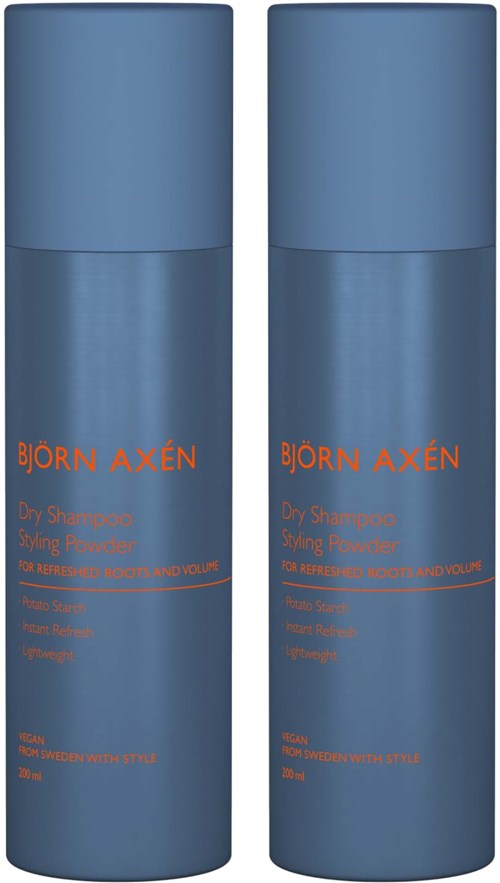 Zwei blaue Flaschen mit Björn Axén Trockenshampoo mit orangefarbenem Text stehen nebeneinander.