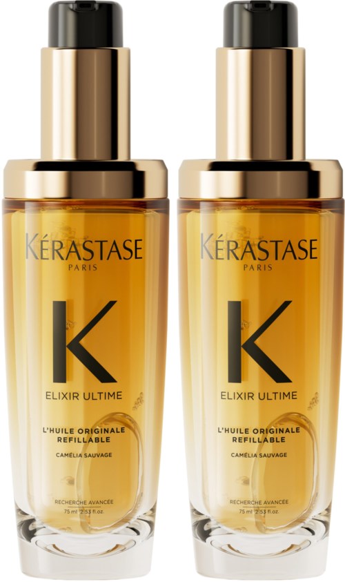 Twee identieke flessen Kerastase Elixir Ultime haarolie, goudkleurig met zwarte doppen en groot 'K' logo.