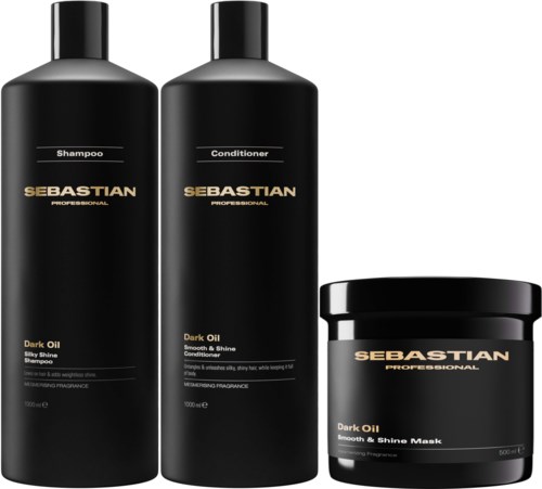 A set of black hair care products: shampoo, conditioner, and a mask, all labeled with gold and white text.