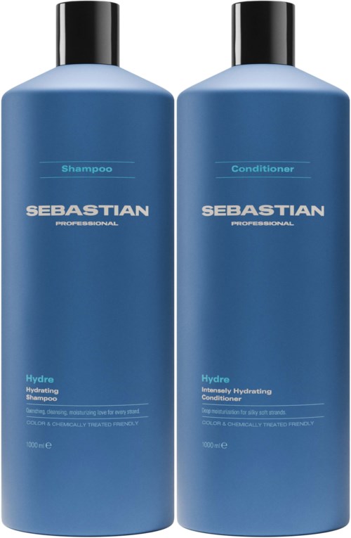 Two blue bottles labeled shampoo and conditioner from Sebastian Professional. They are tall with black caps.