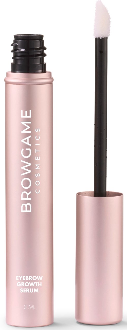 A pink tube of eyebrow growth serum with a black applicator stick next to it.