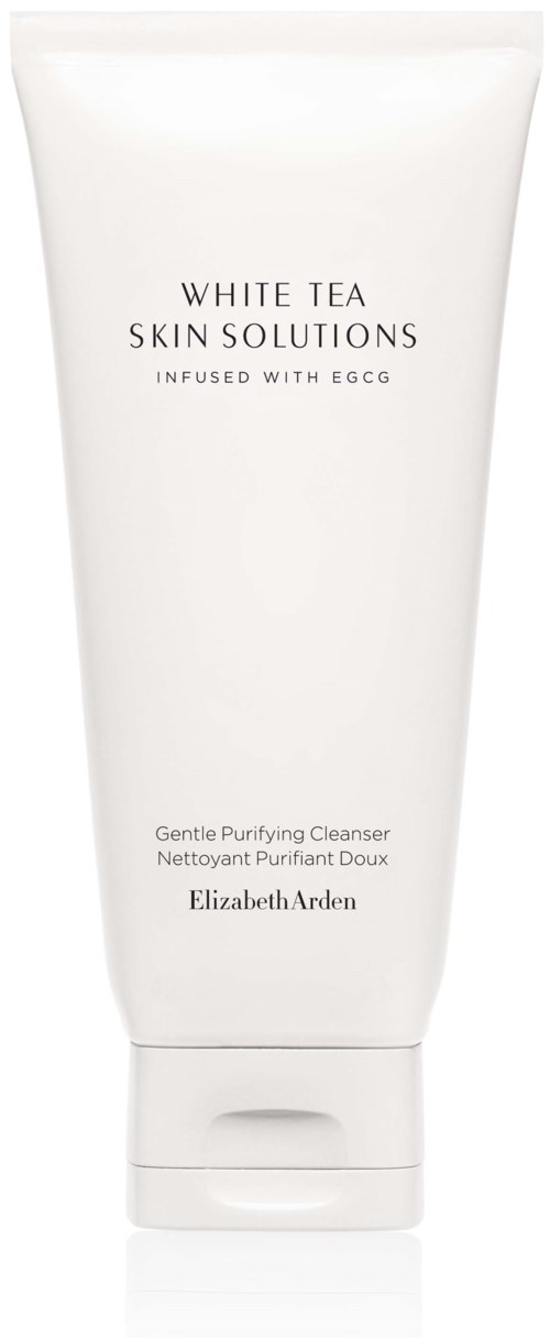 En hvit tube merket 'White Tea Skin Solutions' med detaljer om en mild rensende gel fra Elizabeth Arden.