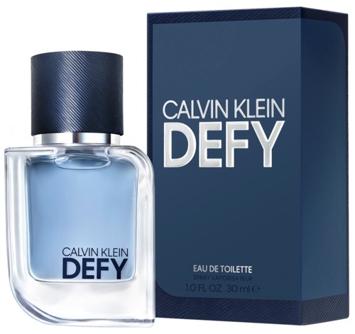 Een parfumfles en doos in blauwe tinten met merknaam 'Calvin Klein Defy'.