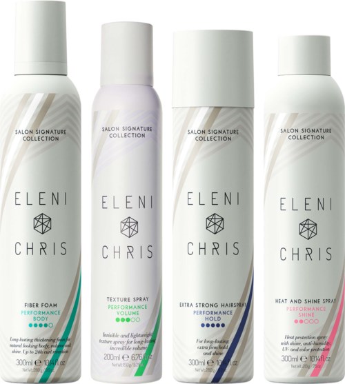 Four white spray bottles with labels, each for different hair or body care products, arranged in a row.