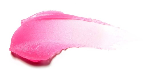 Pink and white makeup swatch with a smooth, curved shape on a white background.