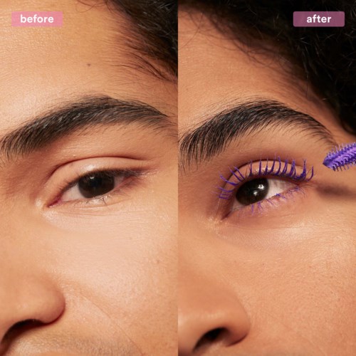 A person's eye with makeup or mascara being applied, showing a difference before and after.