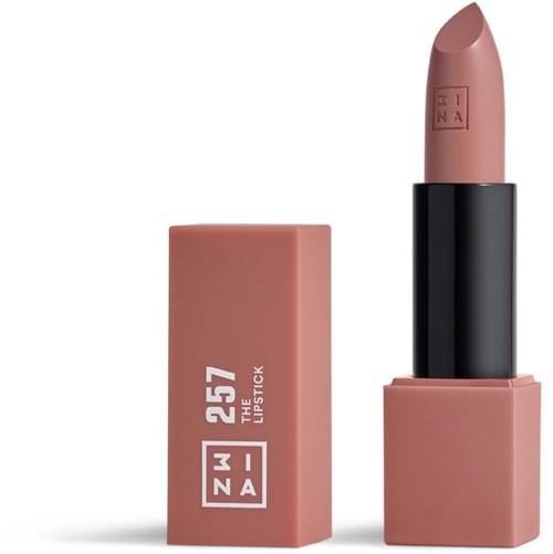 En rosa läppstift med en beige nyans, visad med sin box som har vit text och logo.