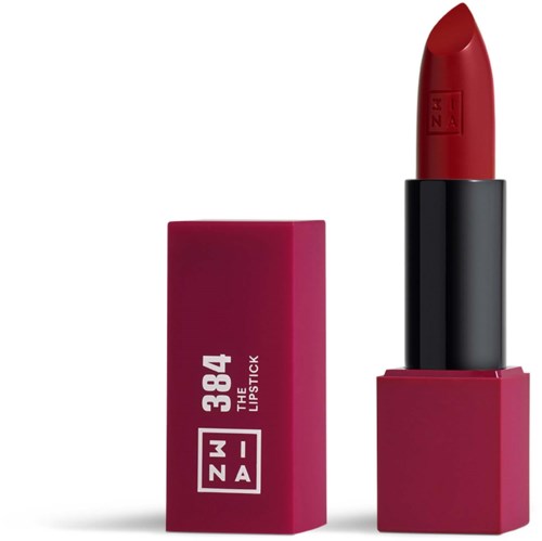 En röd läppstift med ett rosa kvadratiskt paket bredvid, båda märkta "3824 THE LIPSTICK" och "M ZNA."