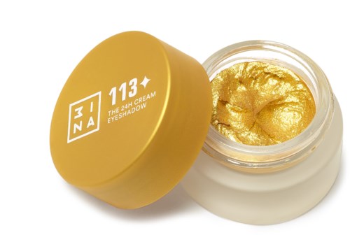 Liten burk med guldfärgad kräm, gul lock och vit behållare. Etiketten visar "3INA 113" och "Eye Shadow".