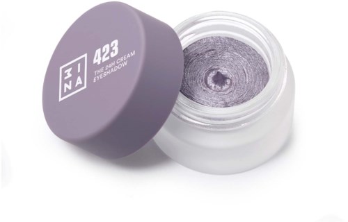En liten burk med lila ögonskugga och lila lock, märkta 3INA 423, på en vit bakgrund.