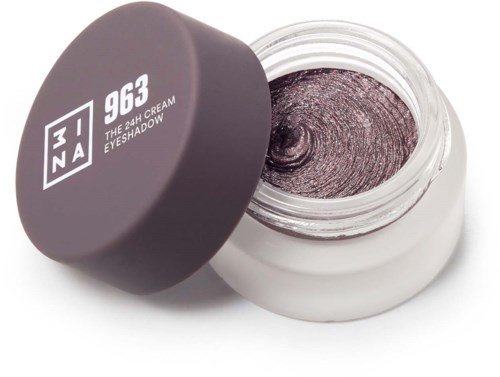 En liten burk med mörk ögonskugga och grå lock, märkt '943 3INA The 24H Cream Eyeshadow.'