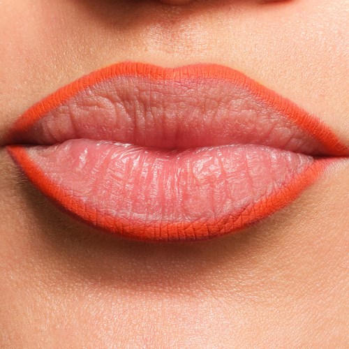 Close-up of lips with orange lipstick, showing detailed texture and natural skin tone.