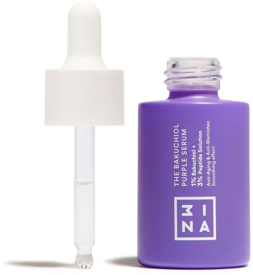 A purple serum bottle with a white dropper cap, labeled with white text about skincare benefits.