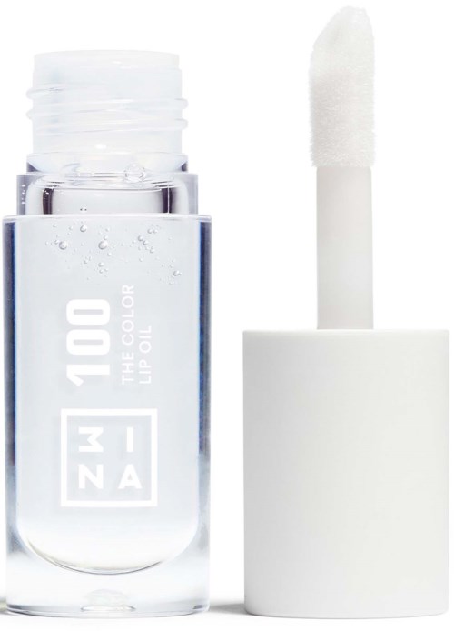 Eine klare Nagellackflasche mit integriertem Pinsel zeigt eine leere, transparente Flüssigkeit im Inneren.