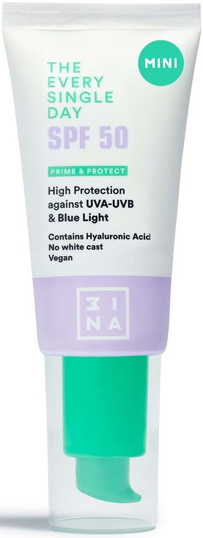 Tölkki aurinkovoidetta, merkitty 'MINI' SPF 50, vihreä ja violetti värit, teksti suojaudesta UV- ja siniseltä valolta.