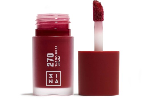 A red lip gloss container with a sponge applicator, labeled '270 THE NO RULES CREAM'.