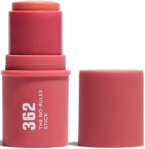 Pink lipstick with a label that says "36 2 THE NO-RULES STICK" and the cap is removed.
