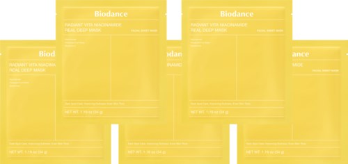 Four yellow packets labeled "Biodance" arranged side by side. They appear to be products or packages.