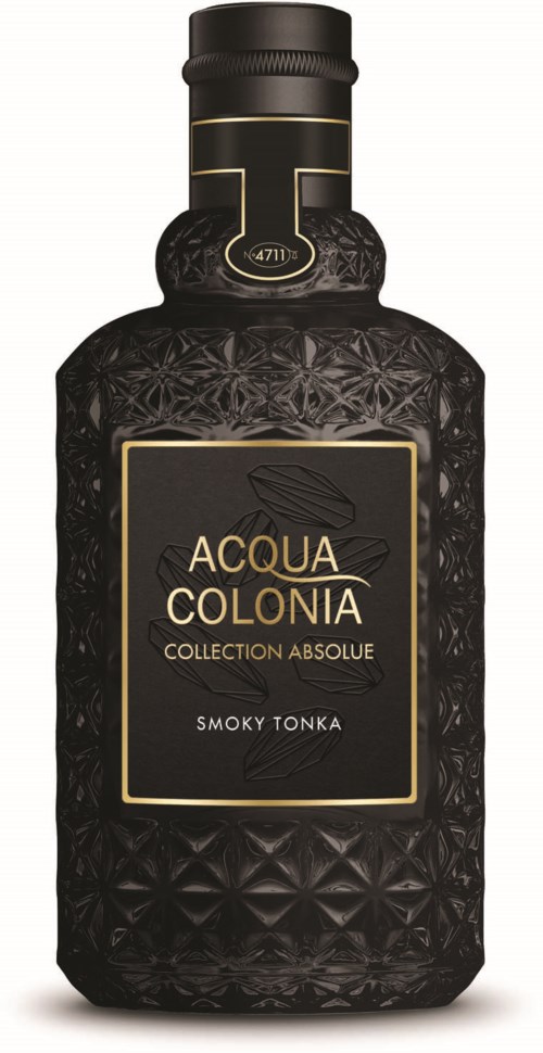 A black bottle with gold accents, labeled 'Acqua Colonia, Collection Absolue, Smoky Tonka,' featuring a textured design.