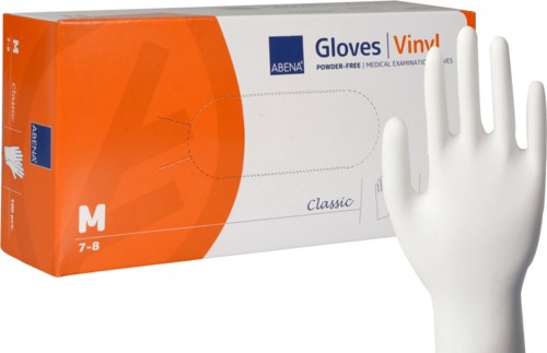 Box of medical examination gloves in orange and white, with a mannequin hand next to it.