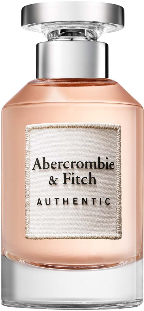 Een parfumfles met een zilveren dop, roze vloeistof en een label met de tekst Abercrombie & Fitch Authentic.