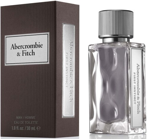 En parfymflaska med en box, båda märkta Abercrombie & Fitch, klar glasflaska med en silverlock och en etikett.
