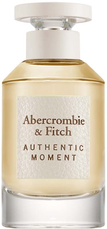 Een parfumfles met label Abercrombie & Fitch Authentic Moment, met een doorzichtige glazen basis en een witte dop.