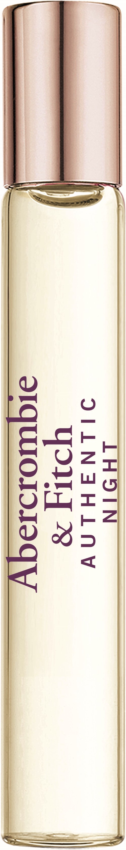 En parfylflaska med ett roséguldlock, märkt 'Abercrombie & Fitch, The Night, Authentic' på en svart bakgrund.