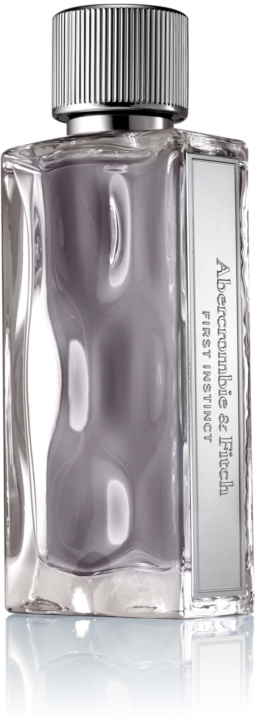 Een kleine, heldere glazen fles met een zilveren dop, gemarkeerd 'Aesop.'