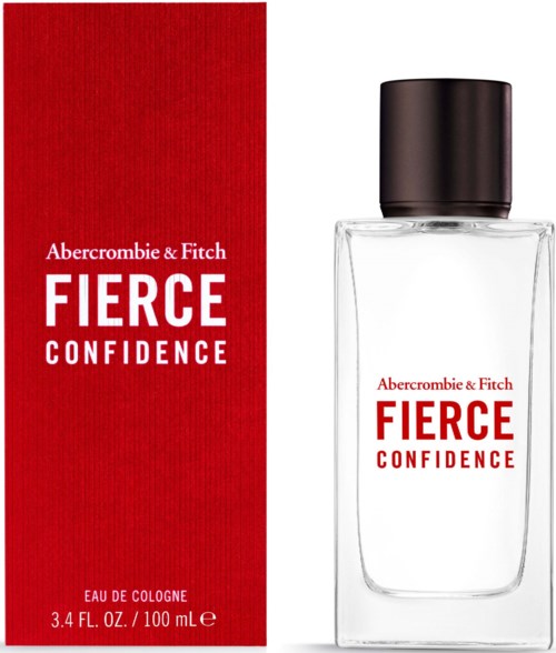 Een parfumfles en doos met de woorden Fierce Confidence, rood en wit ontwerp, schoon en eenvoudig.