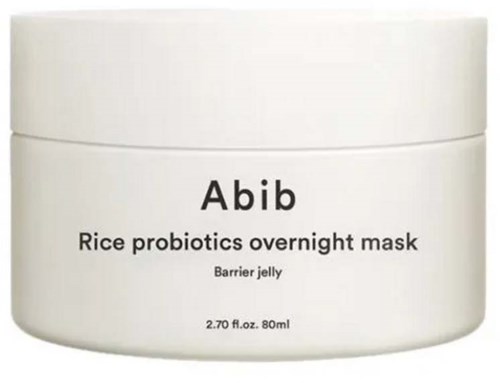 Een witte pot met label 'Abib Rice probiotics overnight mask' en een notitie over barrier jelly. De pot bevat 80 ml.