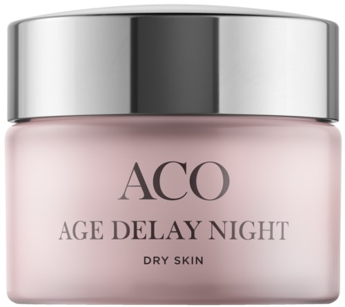 En rosa burk med silverlock märkt "ACO Age Delay Night" för torr hudvård.