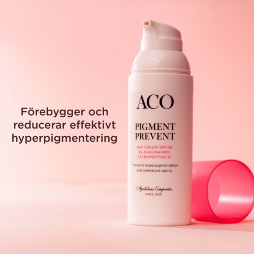Eine weiße Flasche mit ACO Pigment Prevent Tagescreme mit pinkem Deckel vor rosa Hintergrund.