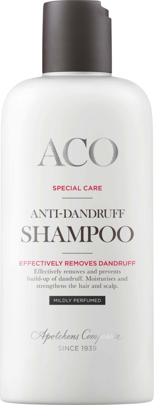 A white bottle of ACO anti-dandruff shampoo with a dark gray cap, labeled as specially effective and mildly perfumed.
