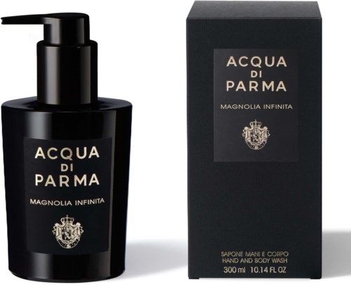 Musta käsien ja kehon pesu pullo pumpulla, sekä sen musta laatikko, jossa lukee 'Acqua di Parma Magnolia Infinita.'