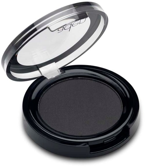 Een zwart ronde make-up compact met doorzichtige deksel, met donkere poeder binnenin.