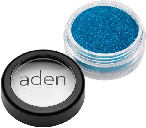 A small container with blue glitter and a black lid labeled "aden."