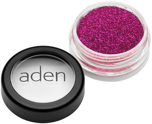 Pink glitter eyeshadow in a round container, with a black and white lid labeled 'aden'.