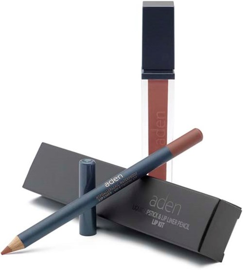 Ein Lippenstift und ein Make-up-Stift mit schwarzer und grauer Verpackung, auf einer schwarzen Schachtel.