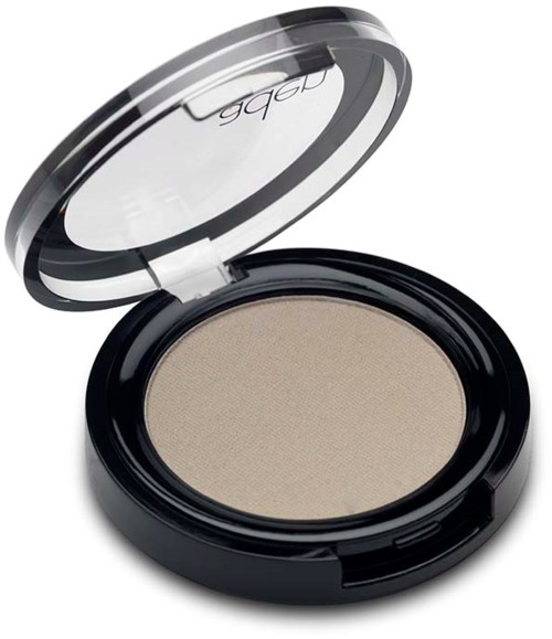 En kompakt rund sminke-emballasje med gjennomsiktig lokk, inneholder beige pudder.