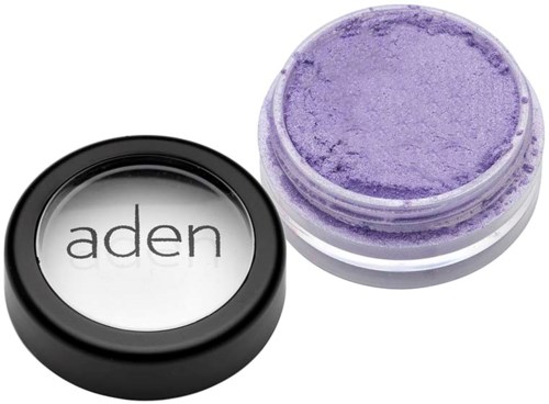A small round container of purple eyeshadow with a black lid labeled "aden."