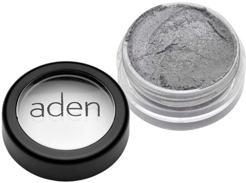 A small jar of gray cosmetic or makeup product with a black lid labeled 'aden' is shown.