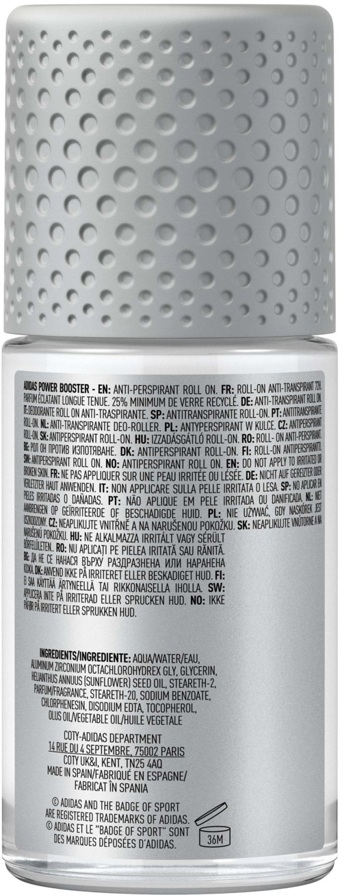 Een kleine spuitbus met een witte dop en tekst op het label, waarschijnlijk een cosmeticaproduct.