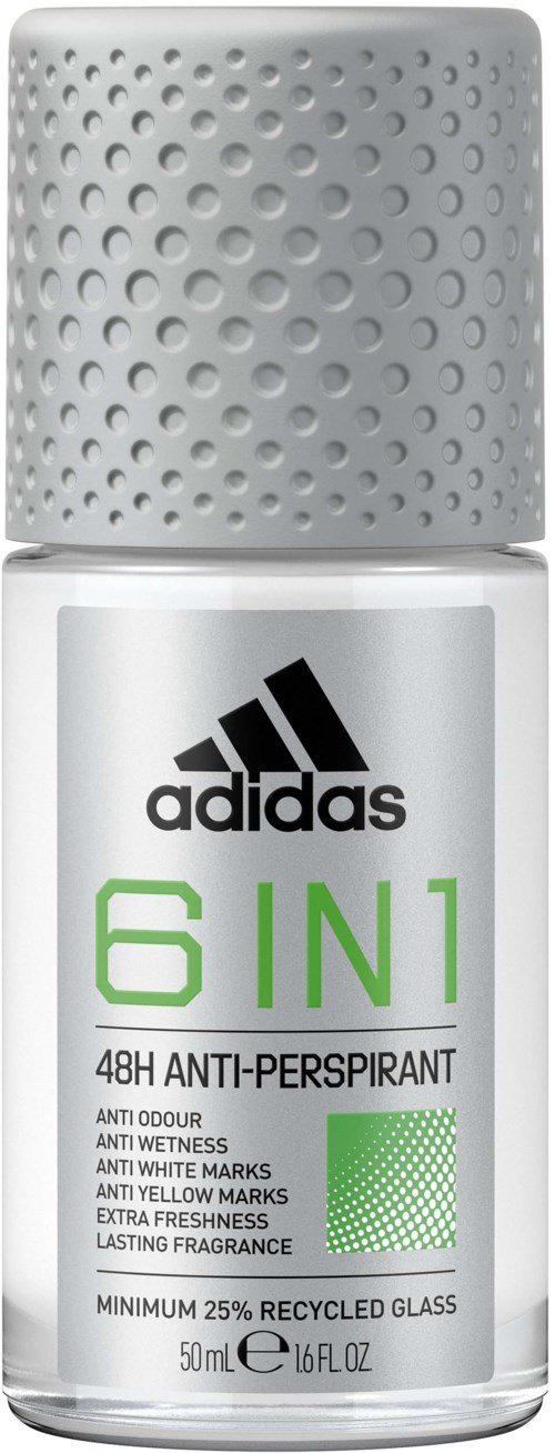 Een witte Adidas 6-in-1 antiperspirant roll-on met geperforeerde dop en groene en zwarte tekst op de fles.