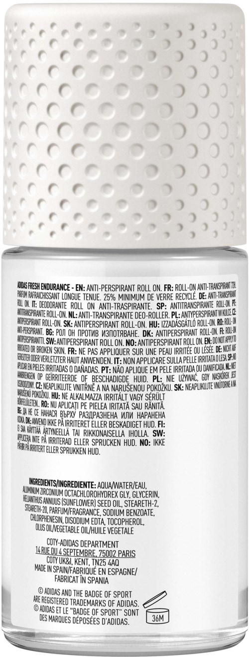 Een witte spuitfles met een stippenkap en gedetailleerd label, waarschijnlijk een cosmeticaproduct.