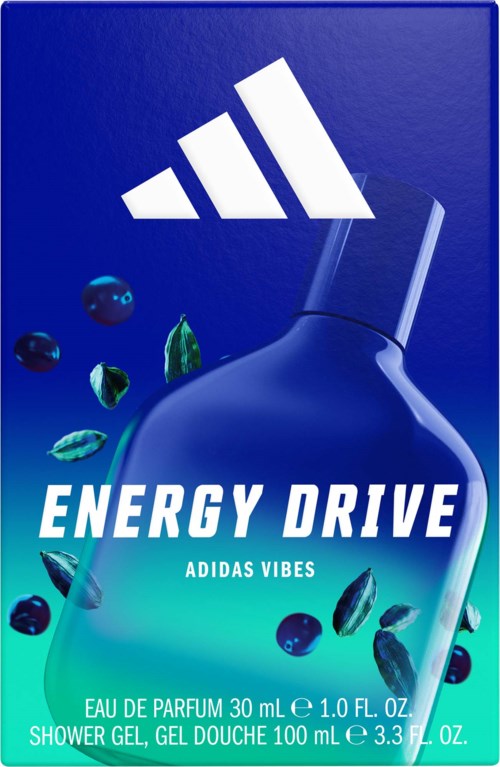 Adidas Energy Drive duschtgelflaska med blå och gröna förpackningar, omgiven av bär och blad.