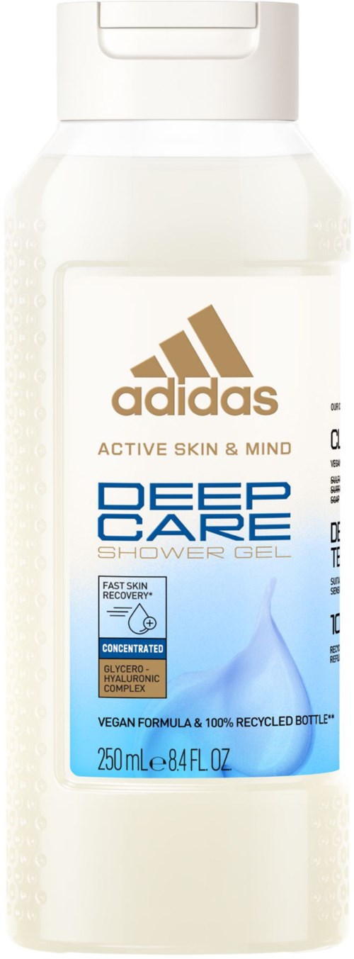 Een doorzichtige plastic fles met Adidas Deep Care Douchegel met witte dop, label toont productinformatie en blauwe design.