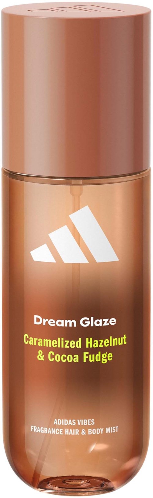 Een roze sprayfles met Adidas-logo en etiket. Het ruikt naar gekarameliseerde geroosterde hazelnoten en cacaofudge.