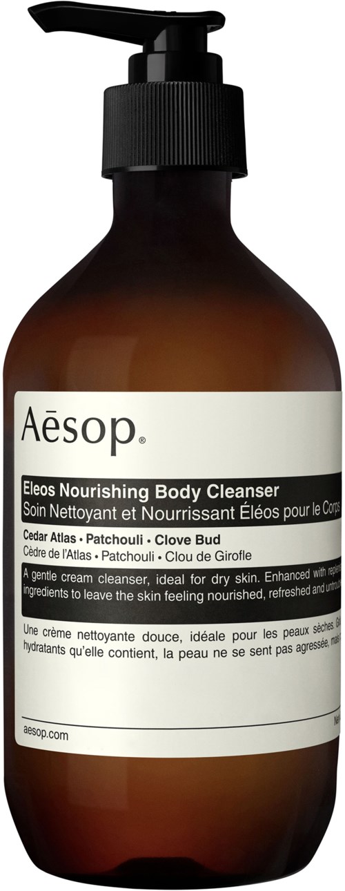 Eine braune Flasche mit Aesop Eleos Nourishing Body Cleanser, schwarzer Pumpspender und weißem Etikett.