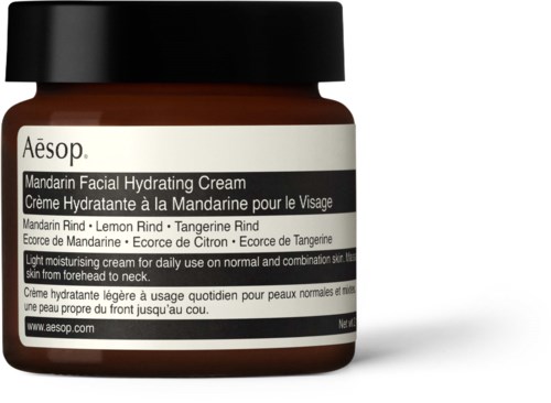 Ein kleiner Behälter mit Aesop Mandarin Facial Hydrating Cream, schwarzem Deckel und weißem Etikett.